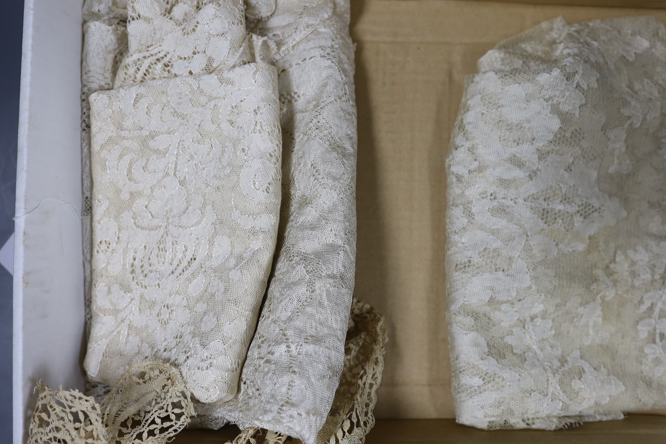 A blonde silk veil, a silk Maltese collar and three later machine silk lace stoles